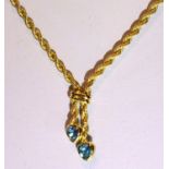 9ct gold rope neck chain with twin topaz set heart pendants, L: 40 cm, 3.9g. P&P Group 1 (£14+VAT