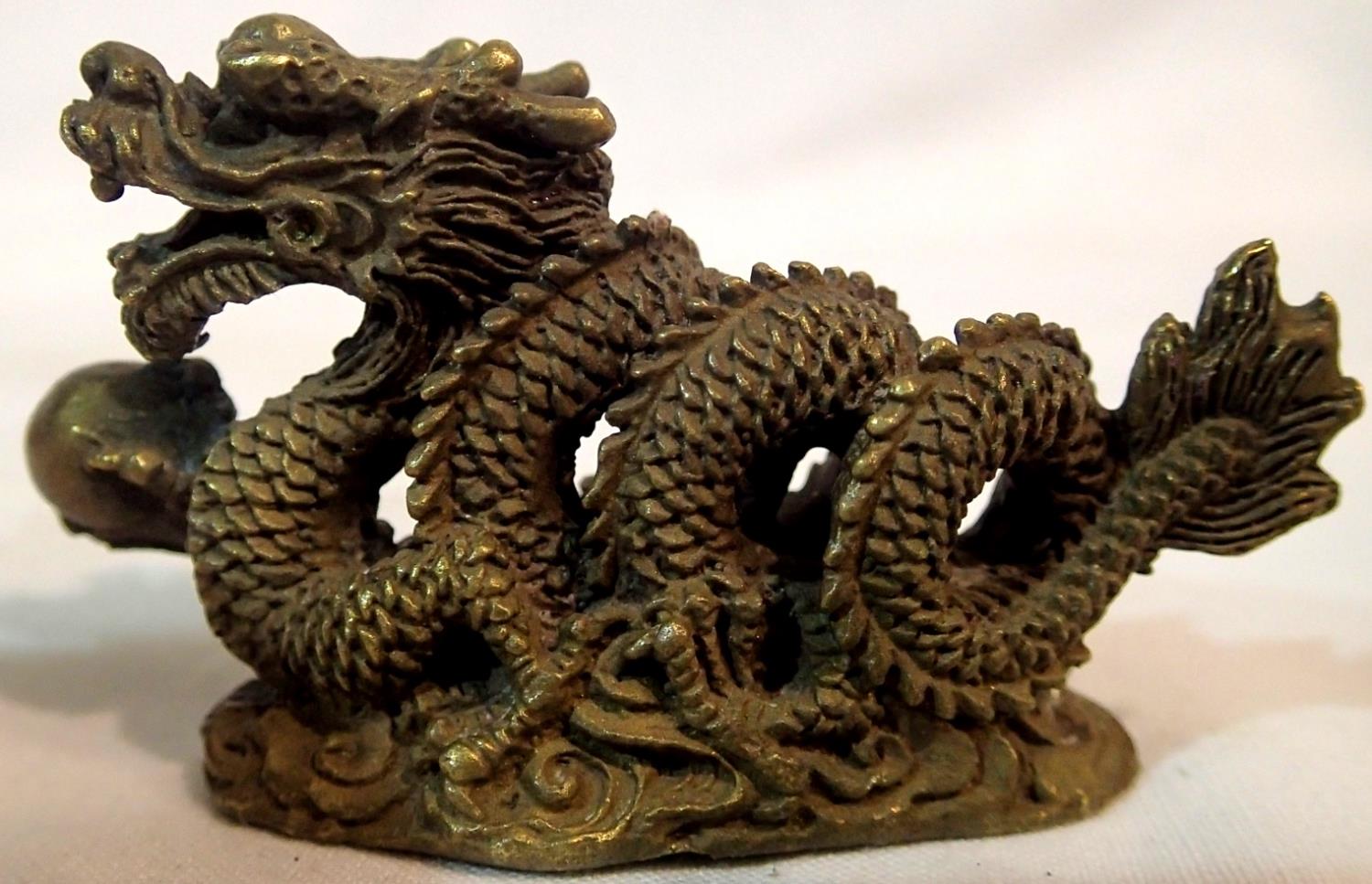 Brass Oriental dragon with ball, L: 65 mm. P&P Group 1 (£14+VAT for the first lot and £1+VAT for - Image 2 of 2