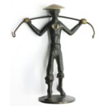 Australian bronze figure with RR? mark, H: 11 cm. P&P Group 2 (£18+VAT for the first lot and £3+