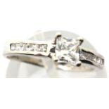 9ct white gold solitaire dress ring with stone set shoulders, size K, 1.4g. P&P Group 1 (£14+VAT for