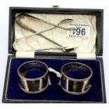 Cased pair of John Dixon and Sons hallmarked silver napkin rings, and two hallmarked silver sugar