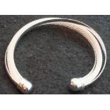 Indian, presumed silver woven torque bangle. P&P Group 1 (£14+VAT for the first lot and £1+VAT for