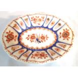 Early Delft ribbed bowl, painted and gilt, L: 21 cm. P&P Group 2 (£18+VAT for the first lot and £3+