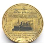 Circular brass compass with screw top recording the sinking of the Titanic. P&P Group 1 (£14+VAT for