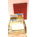 Box of approximately 200 mixed postcards and an empty postcard album. P&P Group 2 (£18+VAT for the