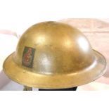 WWII British 8th Army Helmet. Some rust damage and broken strap. P&P Group 2 (£18+VAT for the