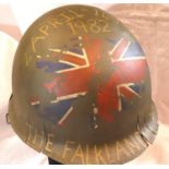 Falklands war memorial helmet. Argentinean helmet taken by a British paratrooper during the Falkland