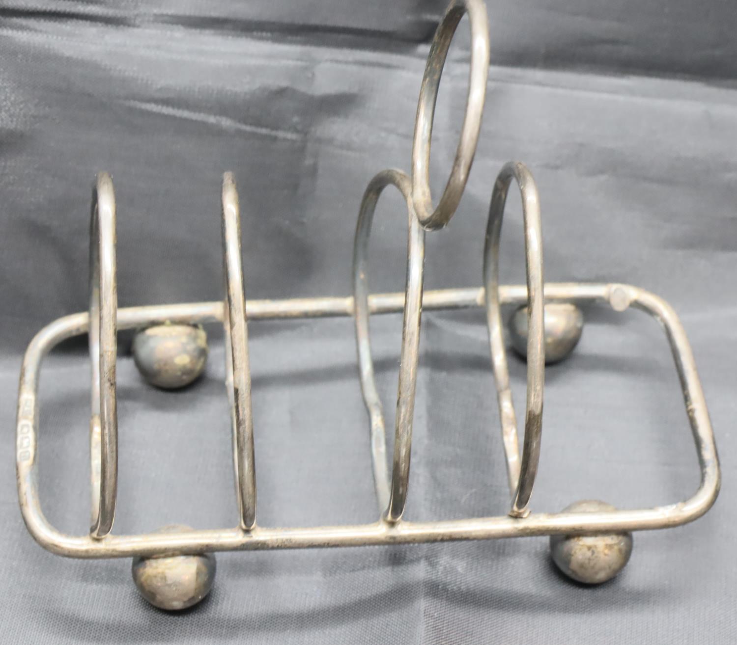 Hallmarked silver small toast rack and a plated candle snuffer. P&P Group 1 (£14+VAT for the first - Image 5 of 7