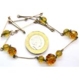 Presumed 9ct gold and amber bead Victorian necklace, 9.3g. P&P Group 1 (£14+VAT for the first lot