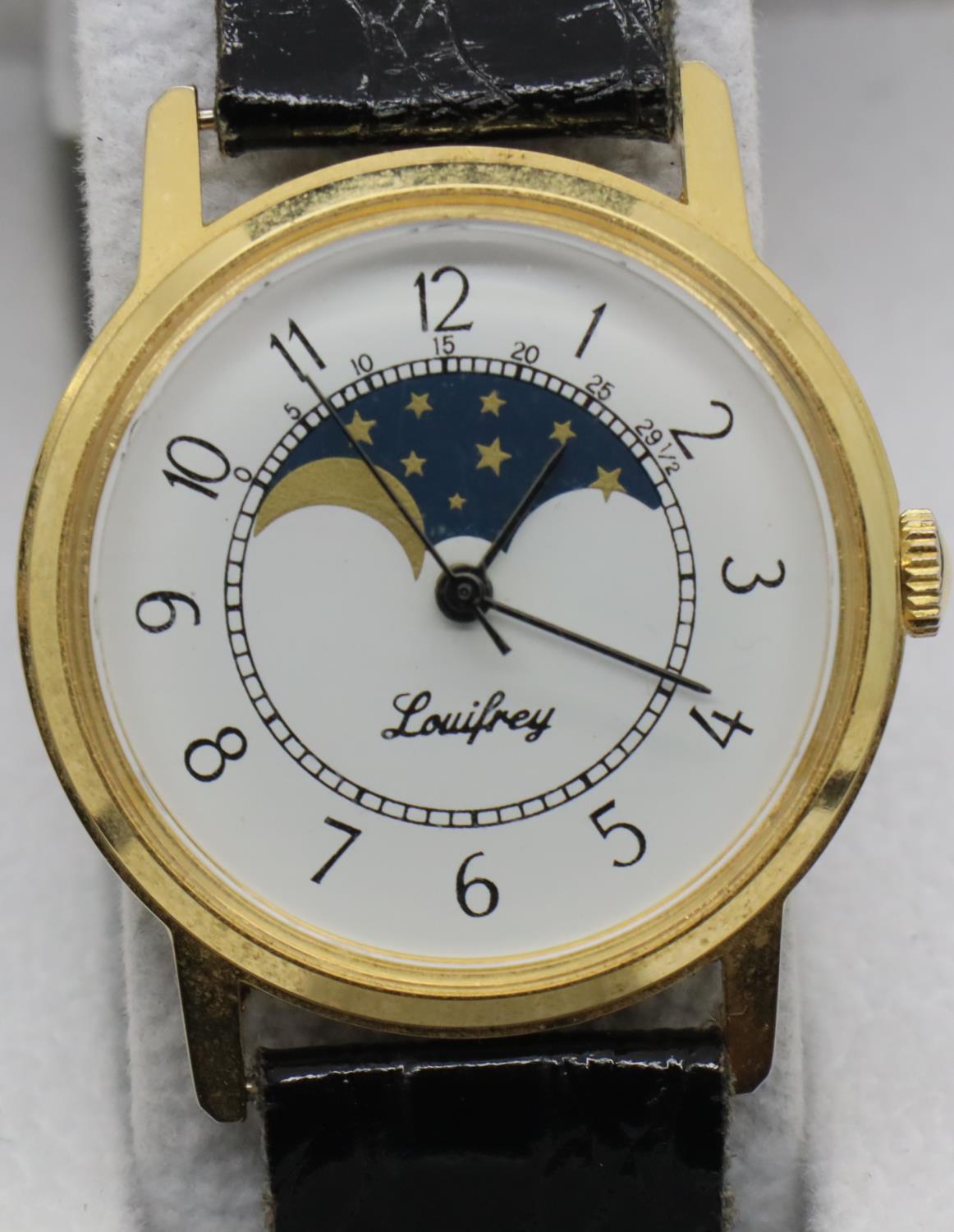 Boxed gents rolling moon wristwatch on leather strap, D: 3 cm. P&P Group 1 (£14+VAT for the first