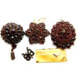 Four antique white metal garnet set brooches and a pendant. P&P Group 1 (£14+VAT for the first lot