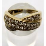 9ct gold and diamond crossover ring, size L, 4.29g. P&P Group 1 (£14+VAT for the first lot and £1+