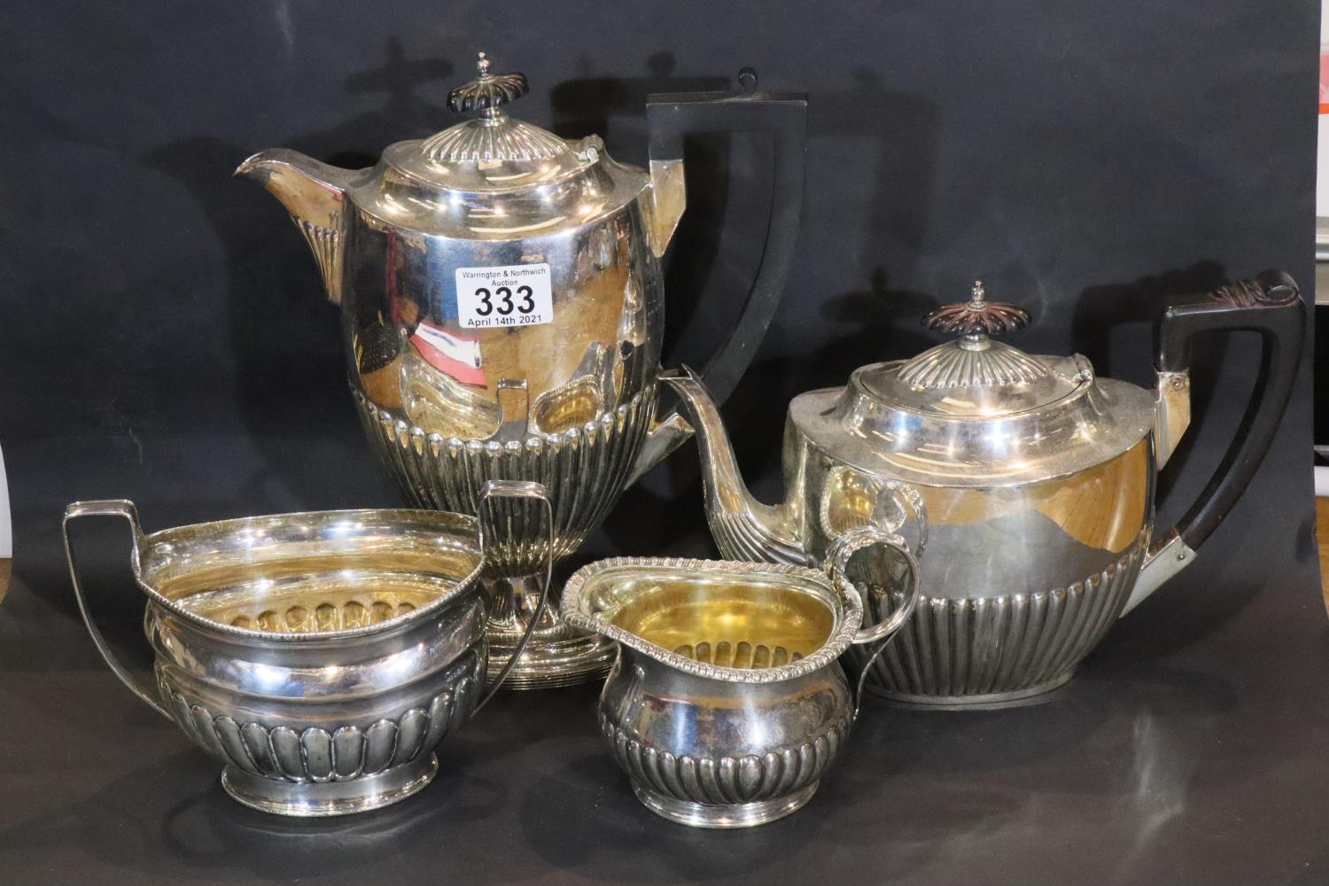 Matched silver plated four piece tea service including Walker and Hall. Not available for in-house