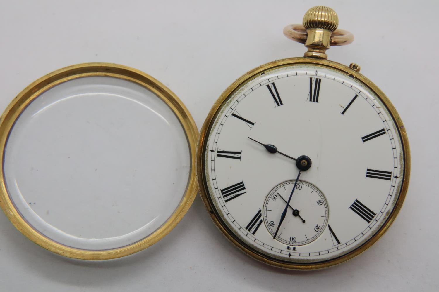 18ct gold fob watch in good working order, white enamel dial with Roman numerals and subsidiary - Image 6 of 12