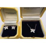 18ct white gold and diamond pendant and earrings set in the form of butterflies by David Robinson,