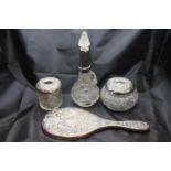 Hallmarked silver dressing table hand mirror, two silver lidded pots and a perfume bottle, mixed