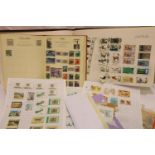 Two albums of mixed world stamps. P&P Group 1 (£14+VAT for the first lot and £1+VAT for subsequent