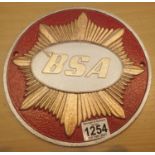 Cast iron red BSA sign, D: 24 cm. P&P Group 1 (£14+VAT for the first lot and £1+VAT for subsequent