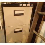 Four drawer filing cabinet, wooden headboard and single extension ladder. Not available for in-house