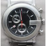 Gents Gucci chronograph wristwatch, having a black dial, stainless steel body and bracelet in