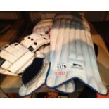 Pair of Slazenger cricket pads and a similar pair of gloves. Not available for in-house P&P, contact