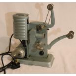 An early Noris 9.5mm projector; good condition; bulb works; can be hand cranked. Made from 1952 in