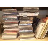 Shelf of mixed music CDs, DVDs and a CD rack. Not available for in-house P&P, contact Paul O'Hea