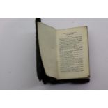 Antique 1 inch New Testament published by Bourne of Harlesden. Undated with paper outer cover, in