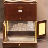 Remy Martin Cognac wooden case with lockable folding lid and mirrored interior. Not available for