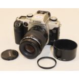 Canon 50E 35ml film camera with Canon 80 ? 200 lens, working at time of lotting. P&P Group 1 (£14+