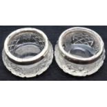 Pair of hallmarked silver top cut glass salts, D: 4.5 cm. P&P Group 1 (£14+VAT for the first lot and
