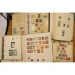 Five postage stamp albums with mixed worldwide content. P&P Group 3 (£25+VAT for the first lot