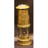 Large and small miners lamps by E Thomas Aberdeen. H: 26cm. P&P Group 2 (£18+VAT for the first lot