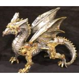 Steampunk style dragon figurine, H: 24 cm. P&P Group 3 (£25+VAT for the first lot and £5+VAT for