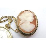 9ct gold mounted cameo brooch with safety chain, 3.5g. P&P Group 1 (£14+VAT for the first lot and £