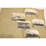 Album of early 20th century shipping related photographic and artistic postcards, 75 in total. P&P