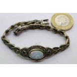 Opal and marcasite set 925 silver bracelet, 18g. P&P Group 1 (£14+VAT for the first lot and £1+VAT