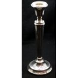 Hallmarked silver weighted candlestick, assay Birmingham, H: 23 cm. P&P Group 1 (£14+VAT for the