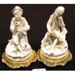 Pair of Italian gilt ceramic seated figurines raised on brass stands, H: 15 cm. P&P Group 3 (£25+VAT