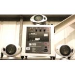 KEF PSW 2010 cinematic sound system comprising sub woofer and three speakers. Not available for in-