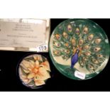 Moorcroft Peacock plate 96/500, Iris pattern pin dish and a boxed Moorcroft presentation plaque,