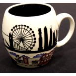Moorcroft Londinium mug, H: 9 cm. P&P Group 1 (£14+VAT for the first lot and £1+VAT for subsequent