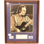 Neil Diamond photograph and signature, with CoA. P&P Group 1 (£14+VAT for the first lot and £1+VAT