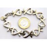 925 silver heart bracelet, 15g. P&P Group 1 (£14+VAT for the first lot and £1+VAT for subsequent