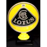 Large cast Lotus sign on wooden base, H: 52 cm. P&P Group 3 (£25+VAT for the first lot and £5+VAT