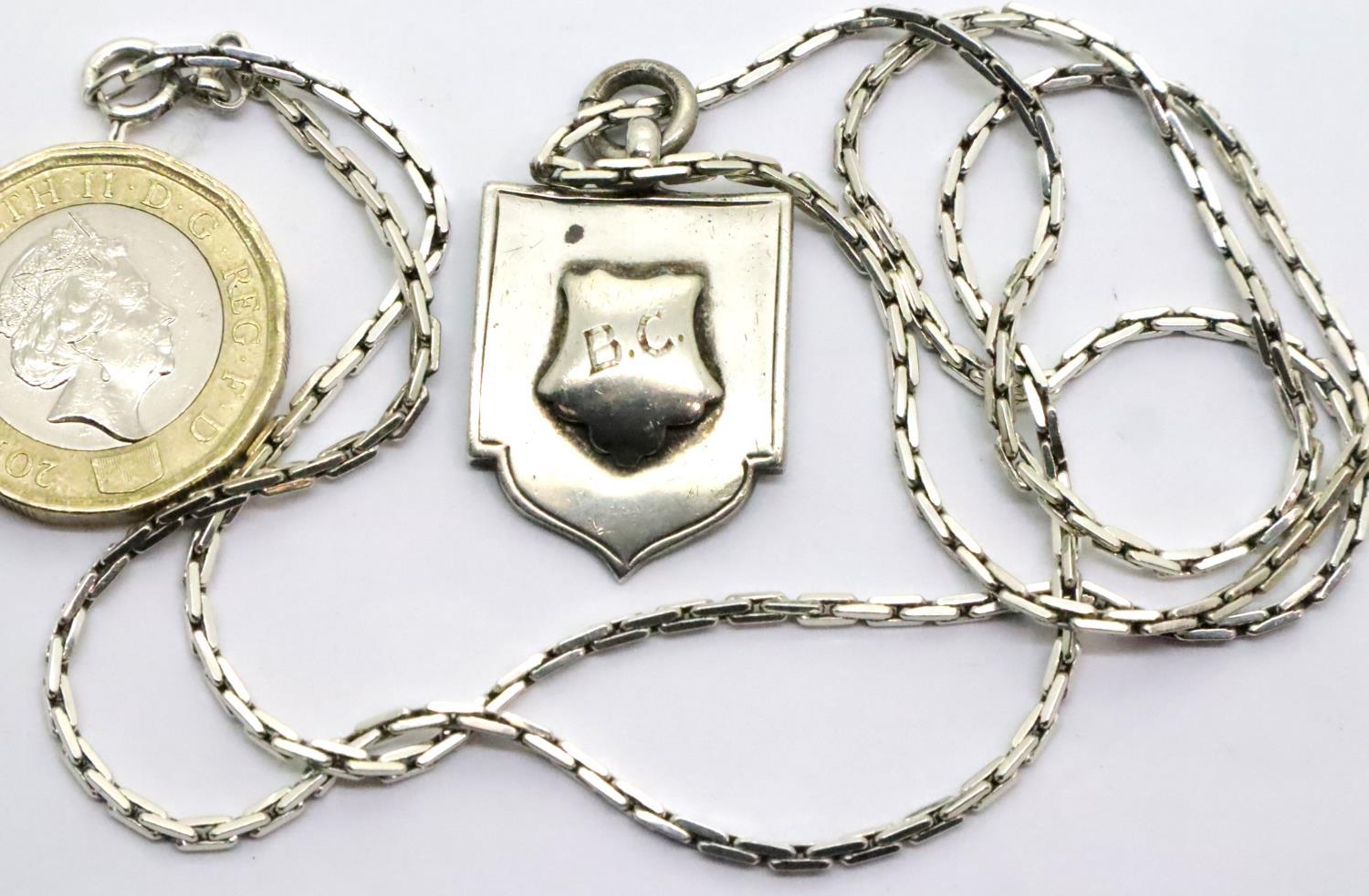 Hallmarked silver fob and 925 silver neck chain, 16g. P&P Group 1 (£14+VAT for the first lot and £