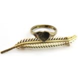 9ct gold leaf brooch and a 9ct gold childs ring size G, 2.5g. P&P Group 1 (£14+VAT for the first lot