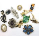 Ten assorted costume jewellery brooches. P&P Group 1 (£14+VAT for the first lot and £1+VAT for