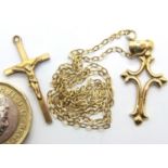 Two 9ct gold crosses and a fine 9ct gold chain, 3.6g. P&P Group 1 (£14+VAT for the first lot and £