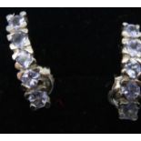 A pair of 9ct white gold earrings, each set with five tanzanite stones, combined 2.1g. P&P Group